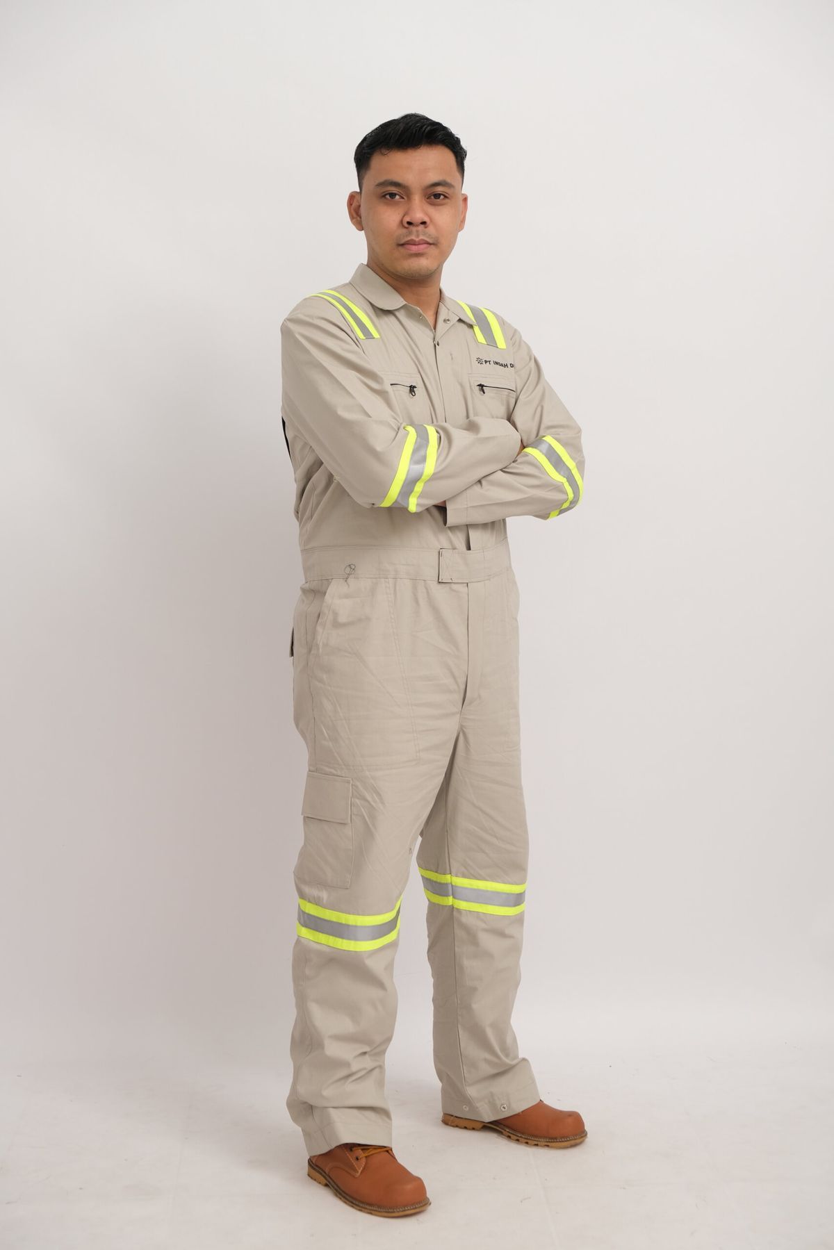Construction professional wearing branded high-visibility workwear