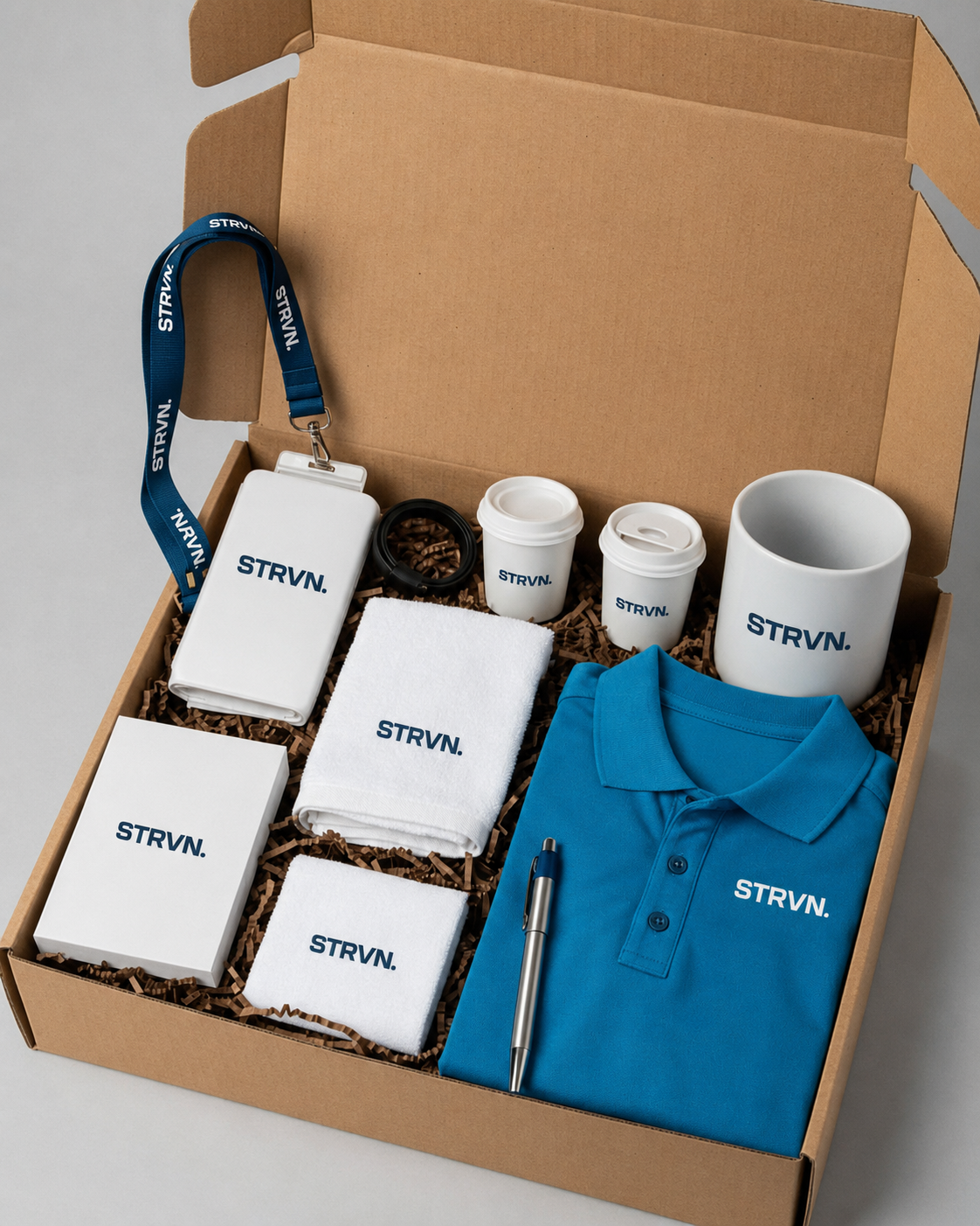 STRVN branded corporate gifting box with coordinated products