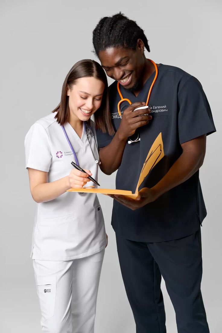Healthcare professionals wearing branded clinical uniforms