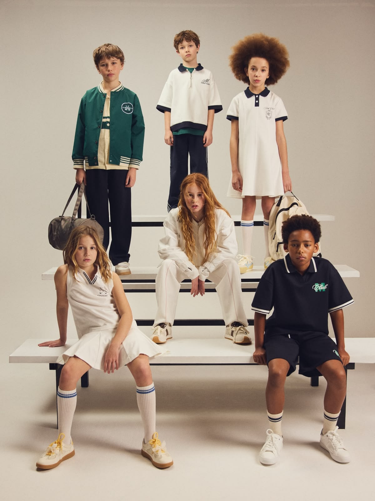 School children wearing coordinated uniforms and sportswear